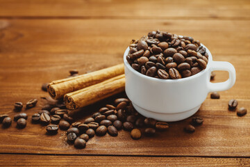 Coffee beans and tea leaves on table. Spices. Concept of taste and choice                      