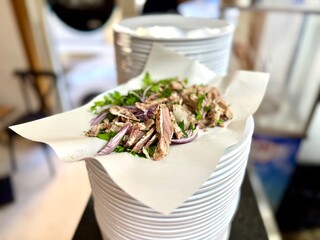 Offal sandwich Traditional Turkish cuisine food kelle sogus. Sogus made boiled beef meat, tongue,...