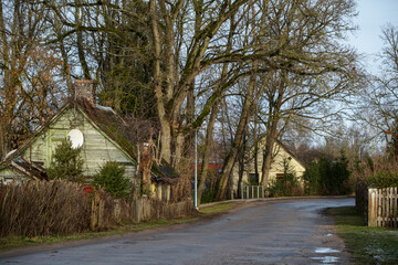 Kandava village street with old houses. Latvian village landscape