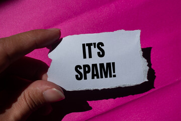 It's spam message written on ripped torn paper piece with a pink background. Conceptual it's spam...