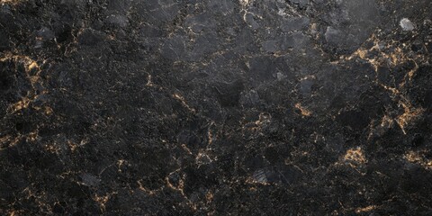 Dark stone surface with gold veining.  Elegant and luxurious texture.