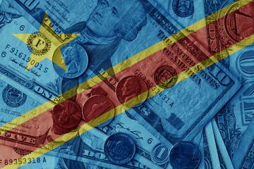 colourful flag of democratic republic of the congo on a dollar money banknotes and coins...