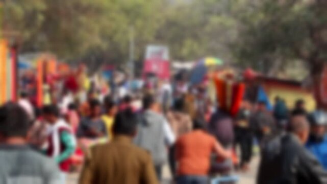 Blurred view of devotees visiting Kumbh Mela festival in Pryagraj, Allahabad, India.