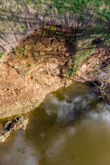 Vertical view of the landslide of the clay bank on the river