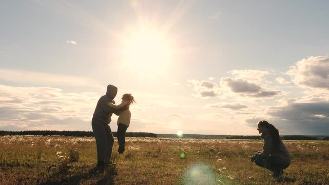 mother child father hug sunset, family happiness run, dream child girl running, mom dad hug sun, girl boy run, fun kid, father mother two children joyfully have fun walking, happy family vacation
