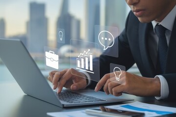 Businessman working on laptop with digital interface showing business ideas, communication, and growth charts.