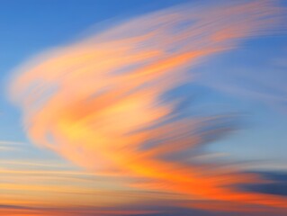 Fototapeta premium Abstract Sunset Sky: Swirling Orange and Blue Cloudscape