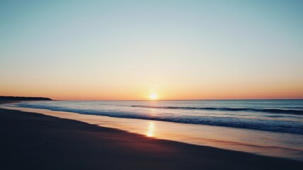 Obraz premium Serene sunrise over ocean beach. Soft focus.