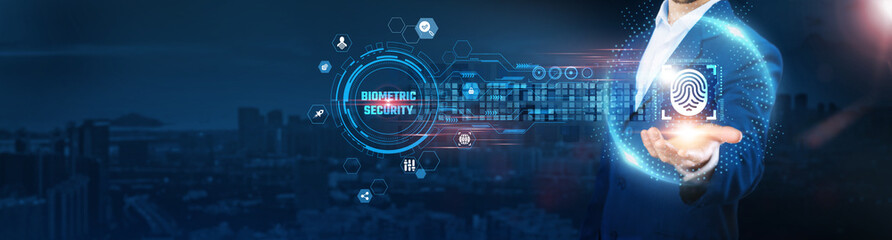 Biometric Security: Businessman holding fingerprint icon and data exchanges representing secure connection on city background, facial recognition, identity verification, authentication, cybersecurity.
