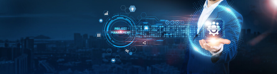 Project Management: Businessman holding icon and data exchanges representing seamless connection on...