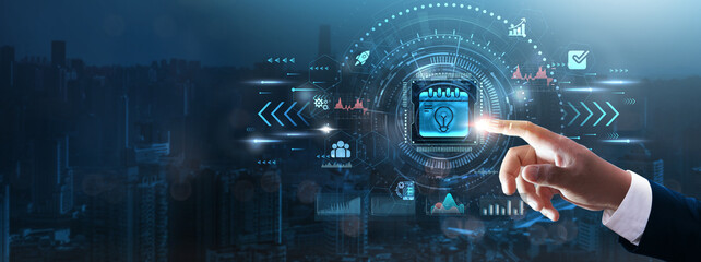 Agenda: Businessman’s hand touching futuristic technological interface, strategic planning,...