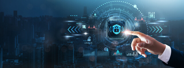 Cybersecurity: Businessman’s hand touching futuristic technological interface, data protection,...