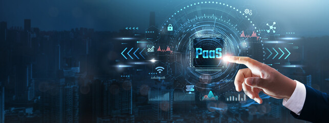 PaaS: Businessman’s hand touching futuristic technological interface, cloud infrastructure,...
