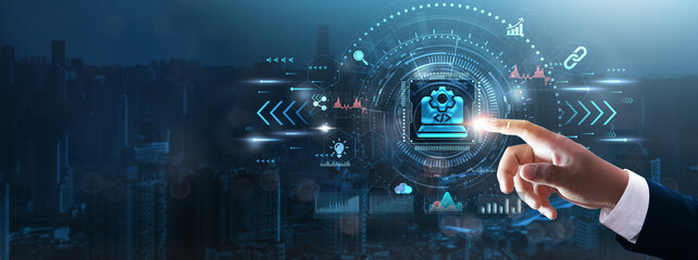 Software Development: Businessman’s hand touching futuristic technological interface, coding,...