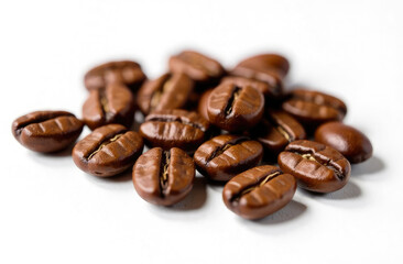 Naklejka premium small pile of coffee beans isolated on a white background