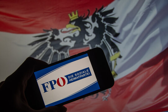 Rheinbach, Germany  26 January 2025,  The logo of the party "FP&Ouml;" on the display of a smartphone in front of an Austrian flag (focus on the logo)