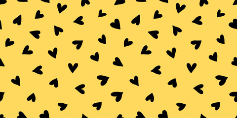 Hand drawn seamless black and yellow doodle pattern with hearts. A playful, modern design, perfect for Valentines Day, textiles, packaging, wallpapers, and more. Vector illustration in bold colors.