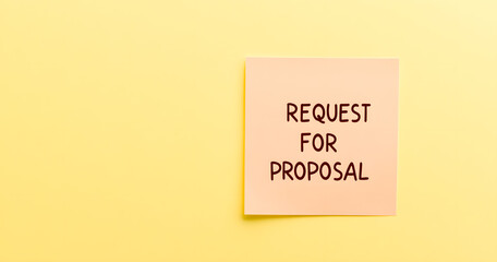 A sticky note with the text 'REQUEST FOR PROPOSAL,' representing business planning, project bidding, and professional communication
