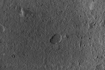 Surface features of a celestial body captured in high detail from a space probe