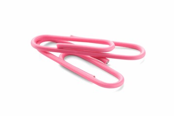 Two pink paper clips isolated on white