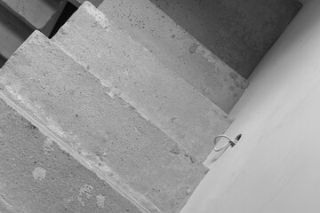 Concrete staircase leading to a lower level area in a modern building