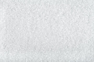 Background from white sea salt, top view. Rock salt texture.