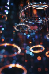 Fototapeta premium Luminous rings hang with bokeh colored dots in background.