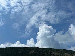Beautiful sky clouds over mountain