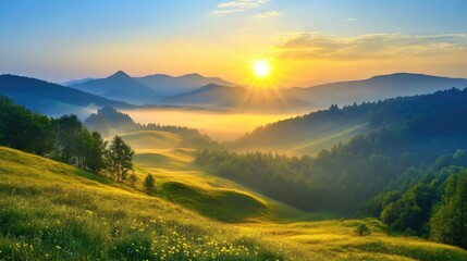 Serene mountain landscape with misty valleys at sunrise