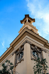 Tower and MNAC Building on Montjuïc Under Blue Sky