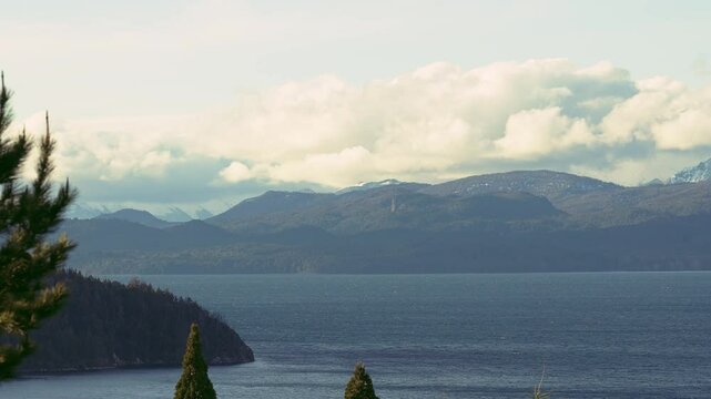 Nahuel Huapi Lake and forested peninsula under clouds in Bariloche