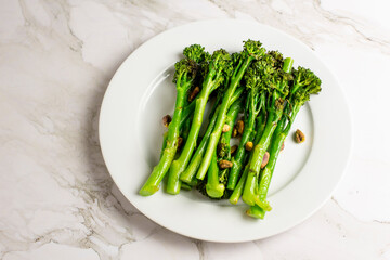 Top view of a plate with broccolini