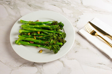 Top view of a plate with broccolini