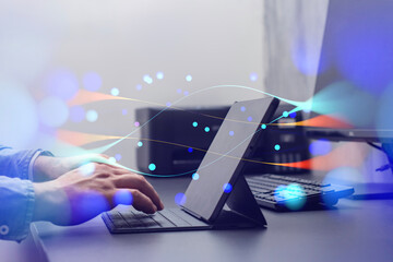 Person interacting with a tablet device with abstract network effects, symbolizing modern...