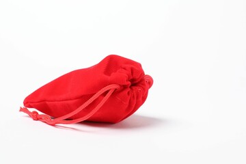 One red burlap sack on white background
