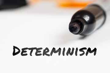 Determinism text on paper marker background