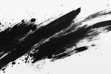 Artistic black paint strokes on a white canvas creating abstract textures and contrast in a creative space