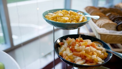 Catering buffet displaying fresh fruit platters