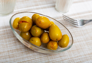 Pickled green olives with a stone - a typical Spanish tapas