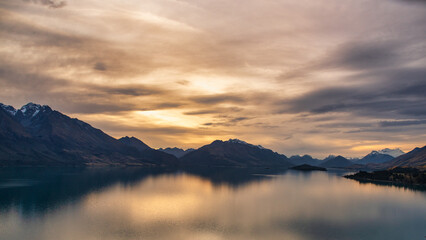 Vibrant dusk cloudscape over Lake Te Anau on the way to Milford Sound