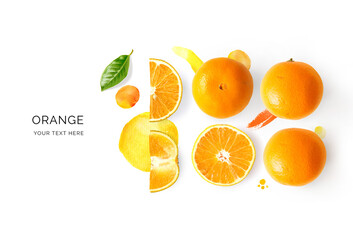 Creative layout made of orange and watercolor spots on the background. Flat lay. Food concept. Lemon on white background.