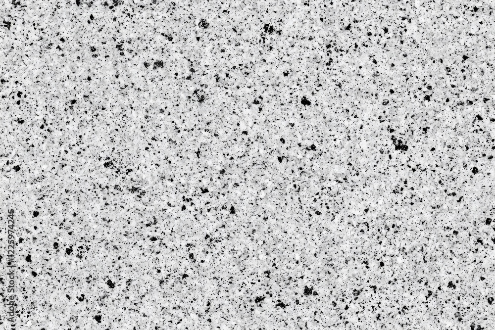Poster granite surface showcasing intricate patterns and textures in a light gray color with subtle black s