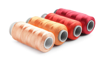 Spools of colorful sewing threads isolated on white