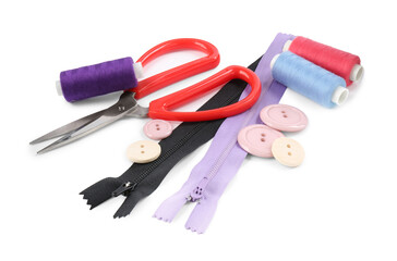 Threads and other sewing supplies isolated on white