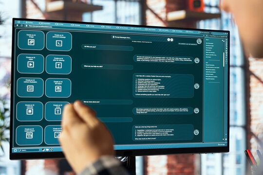 Man in home office uses large language model generative AI chatbot able to engage in humanlike interactions. Close up of artificial intelligence LLM on PC screen handling user requests