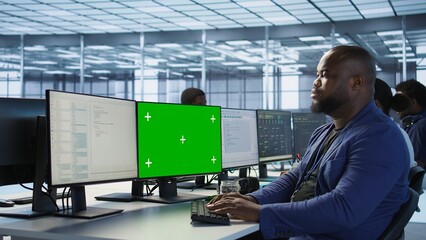 Data center computer scientist using mockup monitor, configuring and troubleshooting hardware....