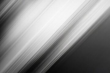 Obraz premium Abstract monochrome background with dynamic light streaks creating a sense of movement