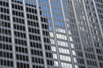 skyscraper under a blue sky