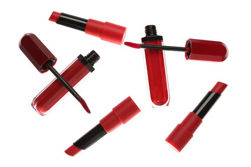 Different red lipsticks on white background