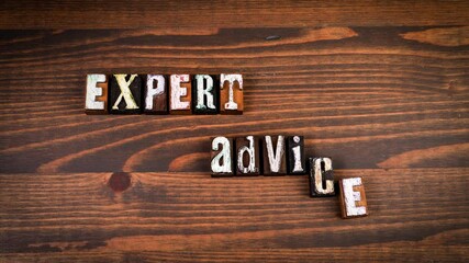 Expert Advice. Text formed from moving letters, stop motion, 4K